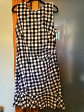Brand new black and wite rufled dress Lauren.